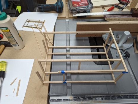 Glueing the strips into a bunk bed shape